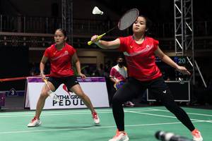 Pasangan DKI Jakarta Ruseli Hartawan/Nahlia Aufa, saat berlaga di semifinal beregu putri PON Papua 2021 (PON PAPUA 2021/Hadi Abdulloh)