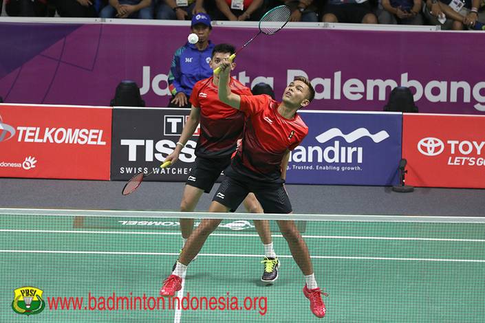 Fajar Alfian/Muhammad Rian Ardianto menghadang pengembalian.