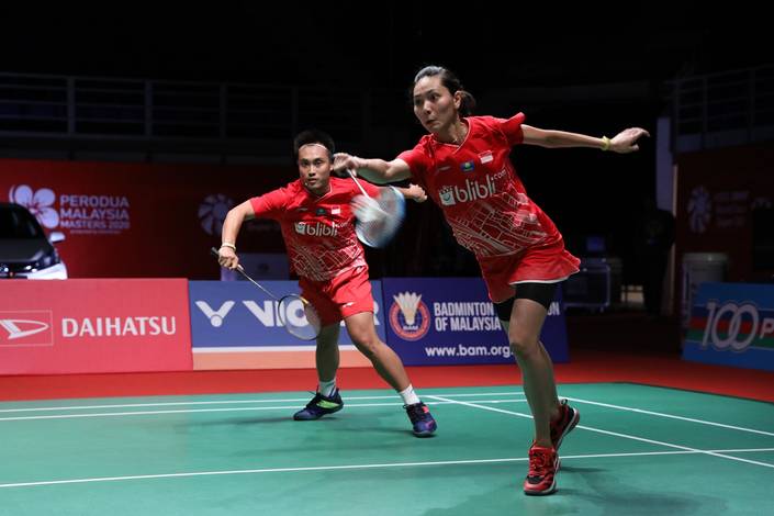Hafiz Faizal/Gloria Emanuelle Widjaja (Indonesia) menghadang serangan.
