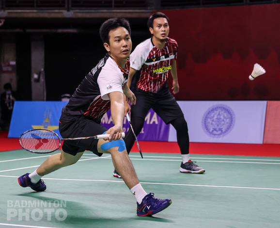 Hendra Setiawan/Mohammad Ahsan (Indonesia) menyambut pengembalian. (Copyright: Badmintonphoto | Courtesy of BWF)