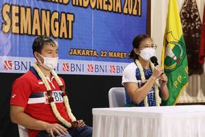 Pemain ganda putri Indonesia, Greysia Polii (kanan) dan pemain ganda putra Indonesia, Marcus Fernaldi Gideon. (Foto: PP PBSI)