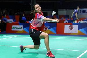 Ruselli Hartawan (Indonesia) menyambut pengembalian.