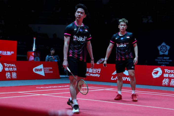Kevin Sanjaya Sukamuljo/Marcus Fernaldi Gideon (Indonesia) saat tampil di ajang BWF World Tour Finals 2019 di Guangzhou, Tiongkok.