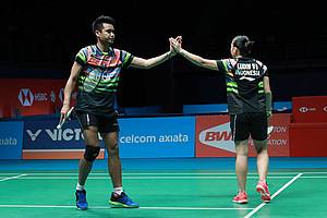 Kekompakan Tontowi Ahmad/Winny Oktavina Kandow (Indonesia) di lapangan.
